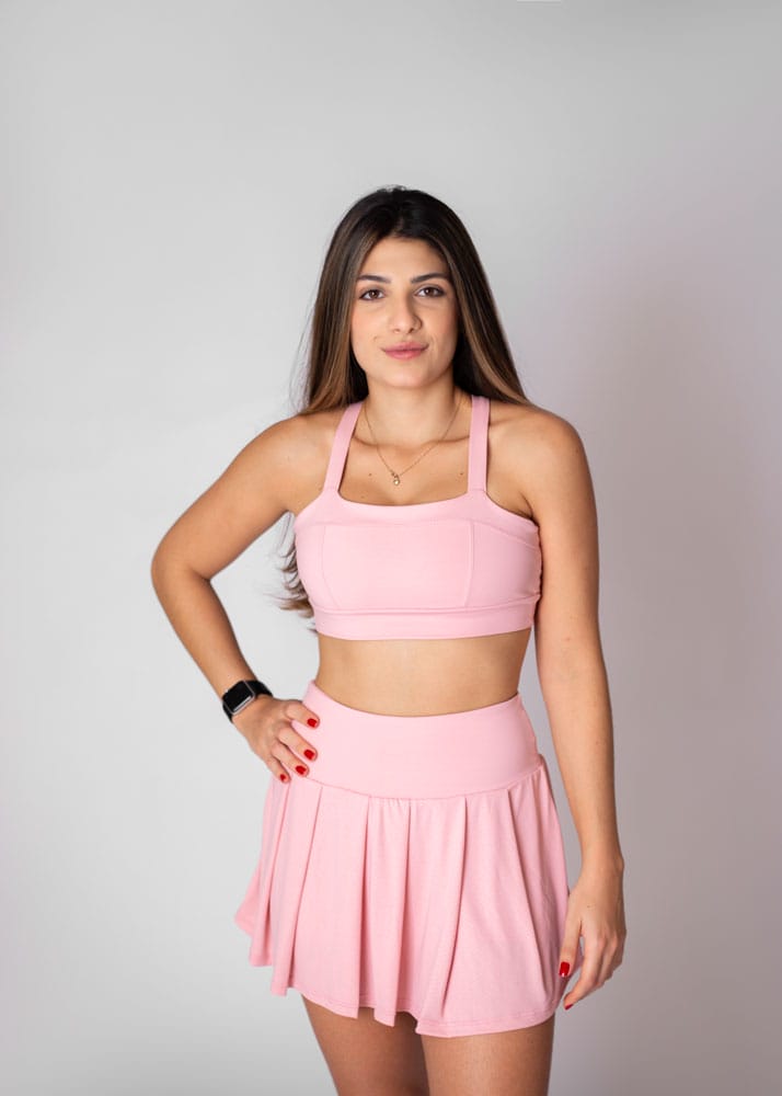 Shorts saia rosa pregas com bolso