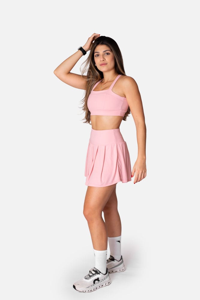 Shorts saia rosa pregas com bolso