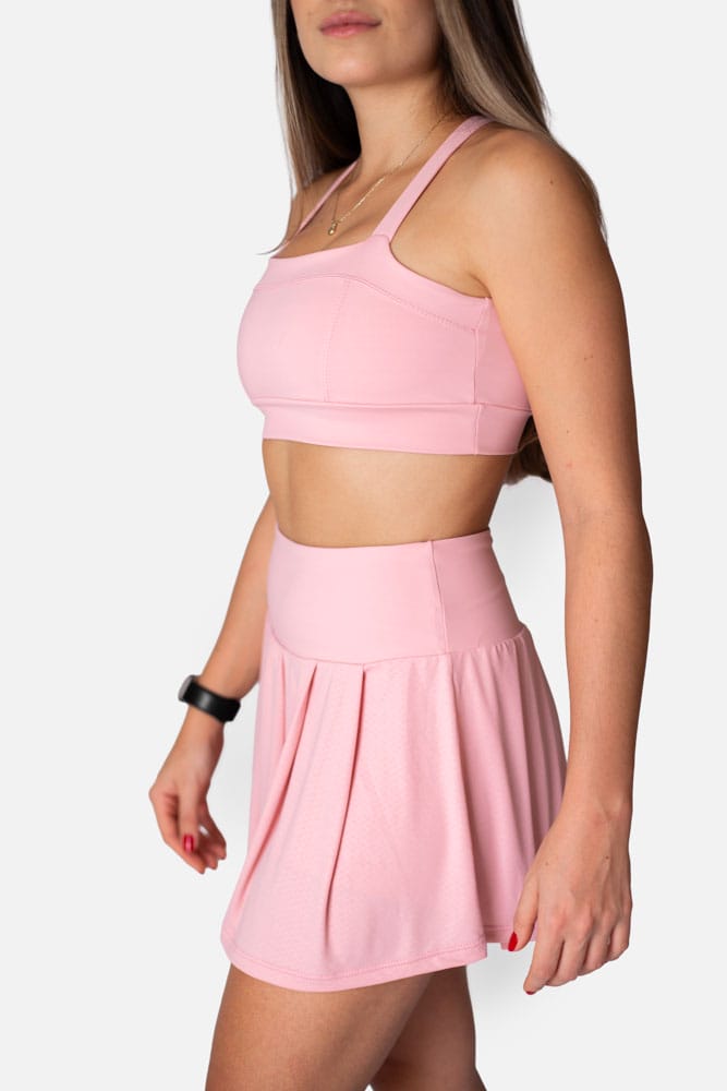 Shorts saia rosa pregas com bolso