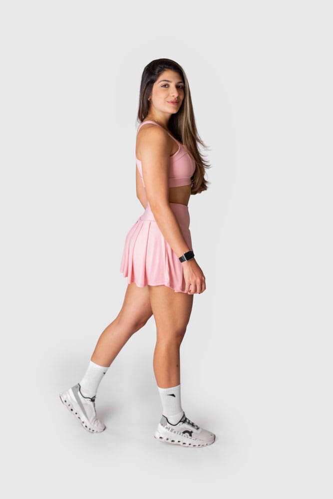 Shorts saia rosa pregas com bolso