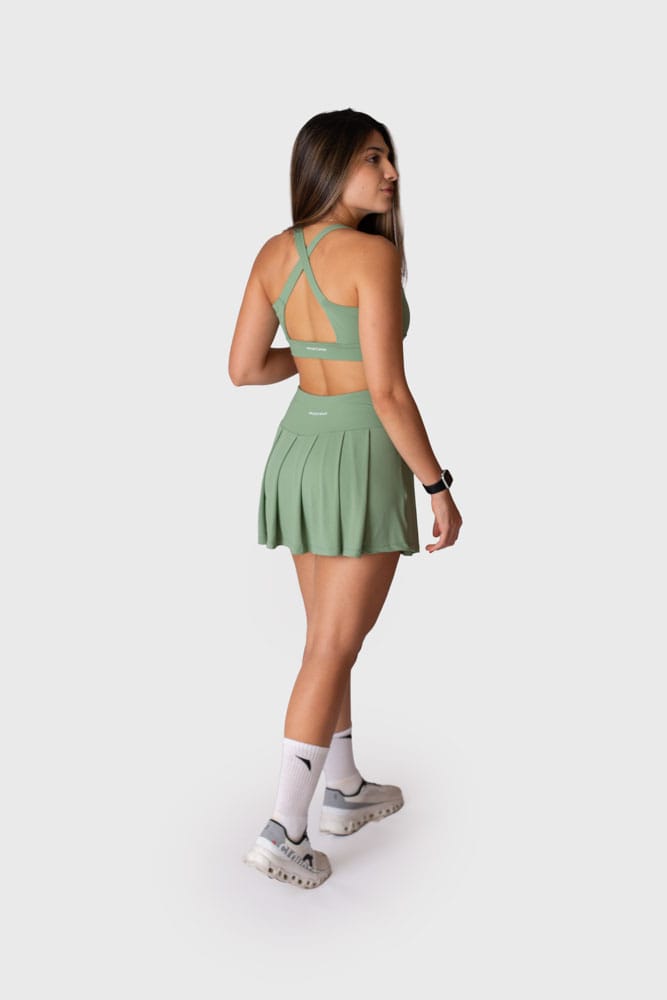 Short saia verde pregas com bolso
