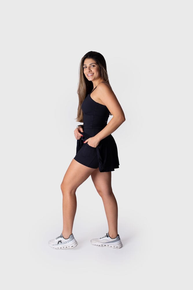 Short saia preto pregas com bolso