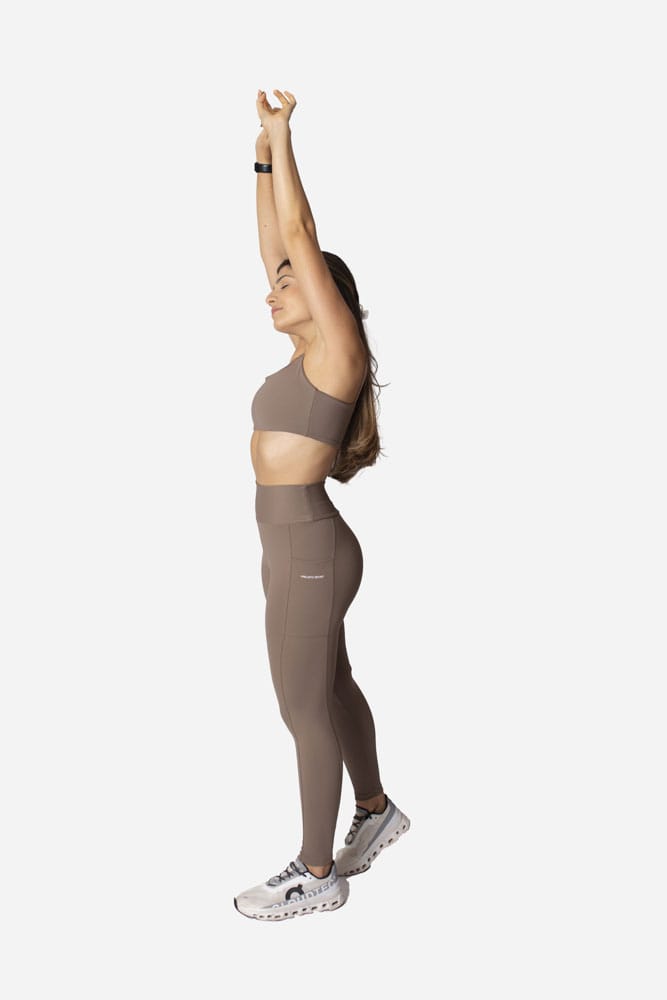 Legging castanho com bolso lateral