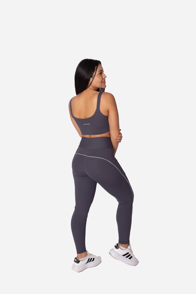 Legging cinza com bolso lateral e viés branco