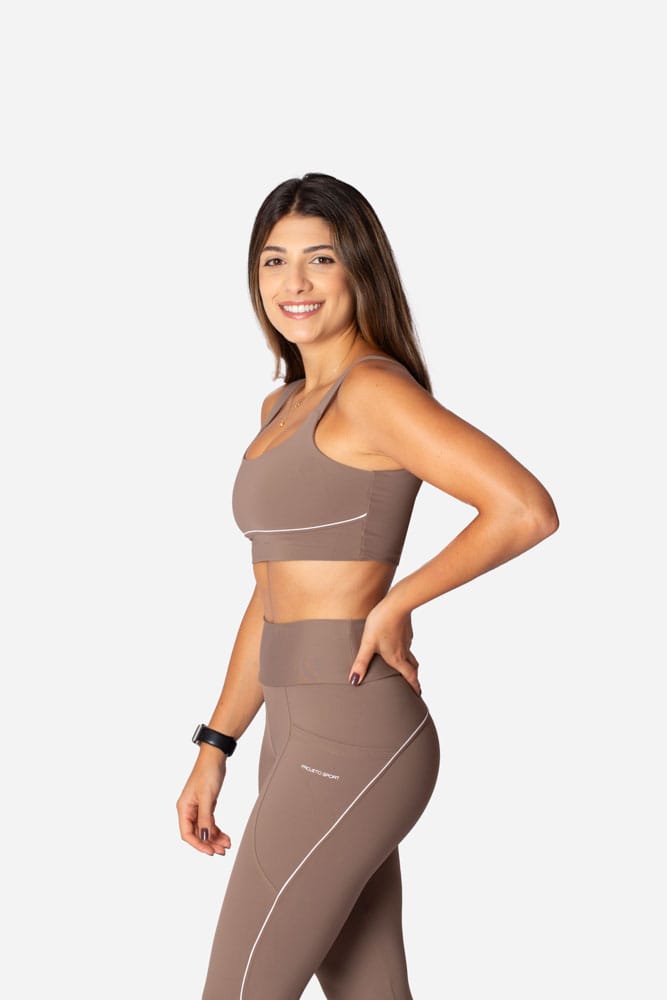 Legging castanho com bolso lateral e viés branco