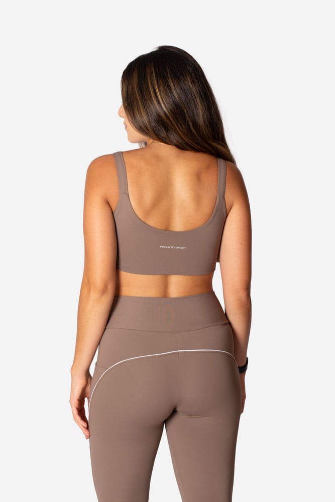 Legging castanho com bolso lateral e viés branco