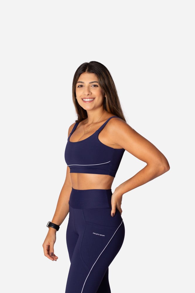 Legging marinho com bolso lateral e viés branco