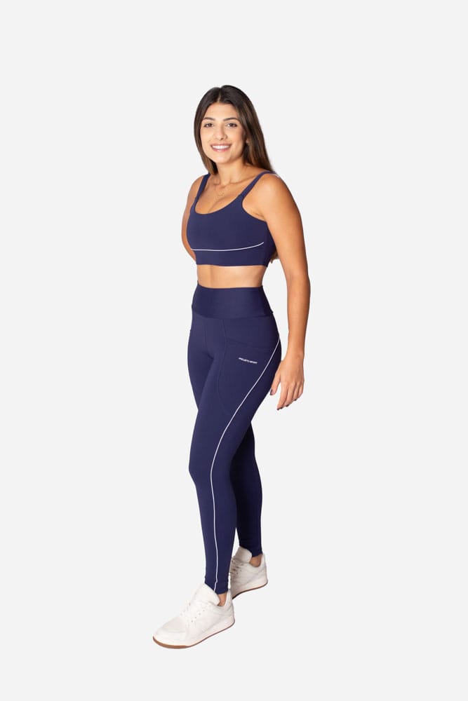 Legging marinho com bolso lateral e viés branco